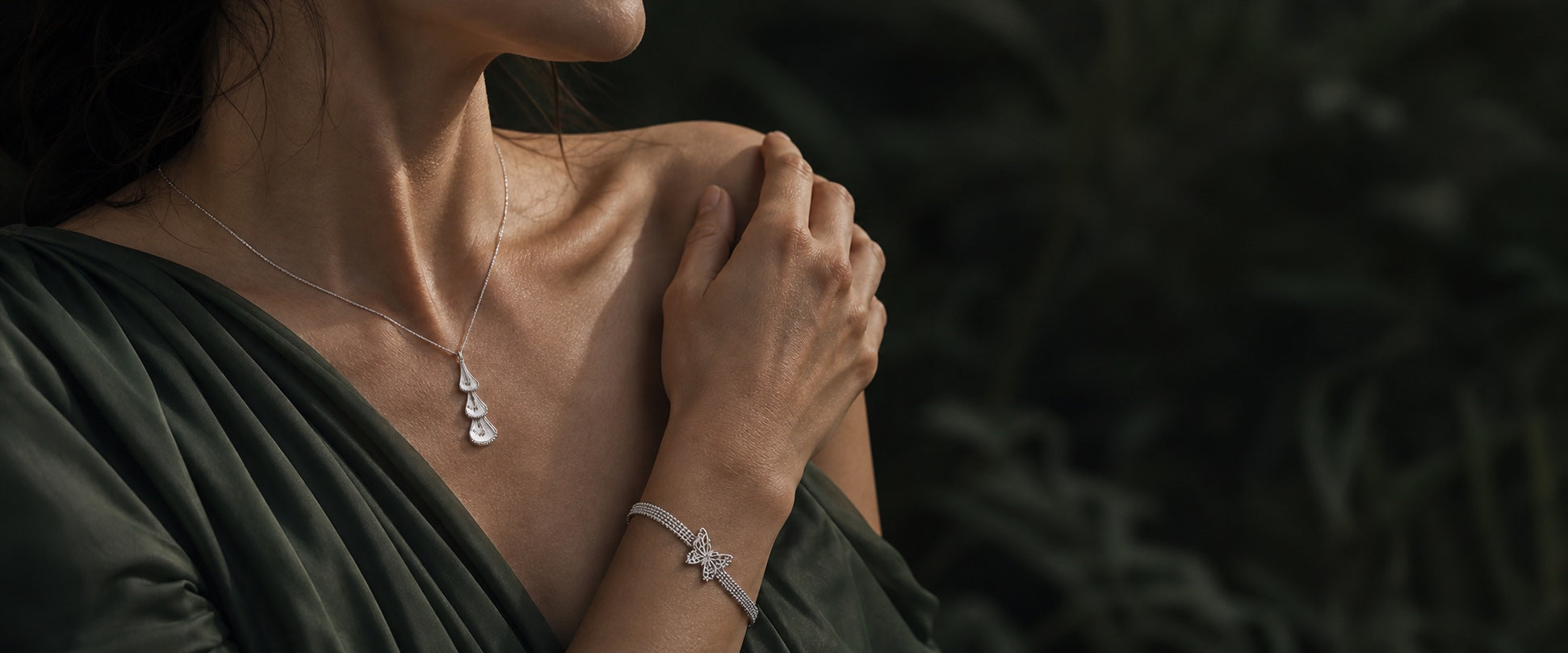 Molly Sisters sculptural silver jewelry worn close to the body